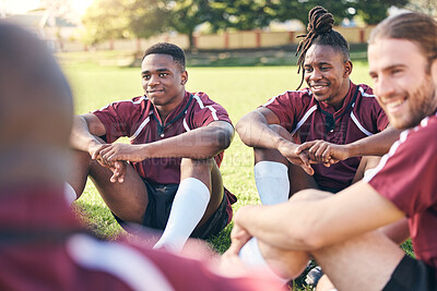 Buy stock photo Sports, rugby and men on grass for rest at training, practice and exercise workout for match. Fitness, teamwork and male people relax for planning strategy for competition, challenge or game on field