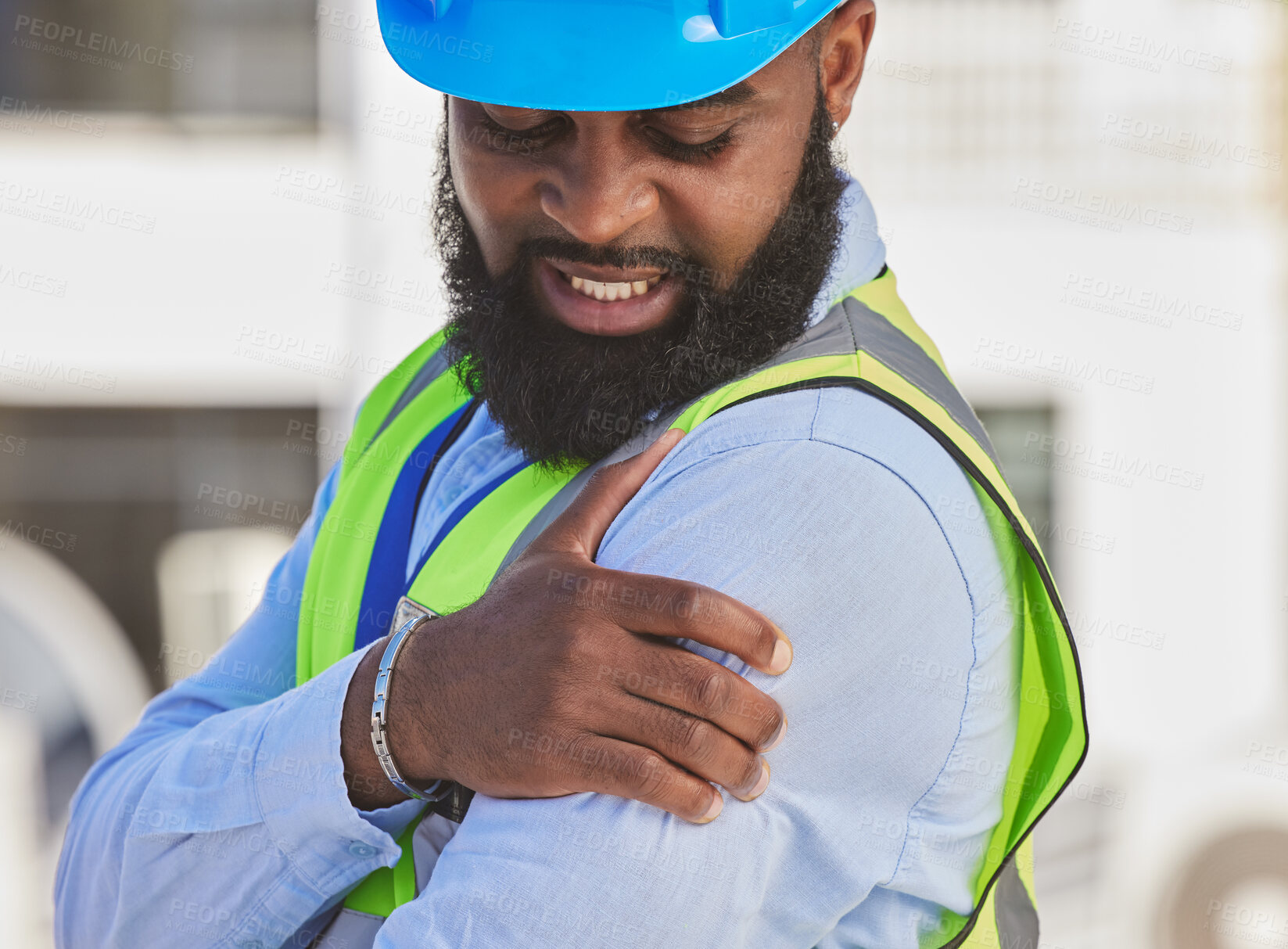 Buy stock photo Black man, engineer or hand on shoulder pain, injury accident or muscle tension on rooftop. Hurt, stress or injured male contractor with sore arm, ache and joint inflammation at construction site