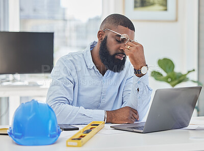 Buy stock photo Architecture, tired and headache with black man and laptop for stress, anxiety or mental health. Engineering, construction and planning with contractor in office for eye strain and project management