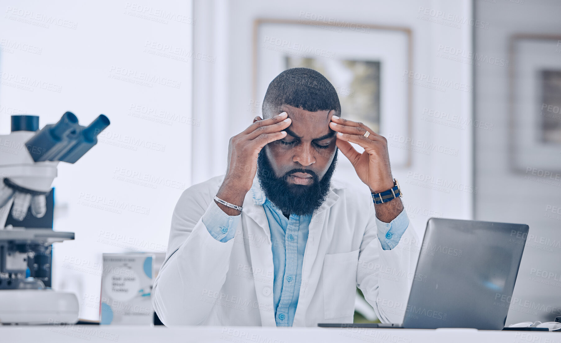 Buy stock photo Headache, stress and tired man with burnout from science, research mistake and laptop error in laboratory. Sick, sad or frustrated african scientist with pain, migraine and fatigue for mental health 