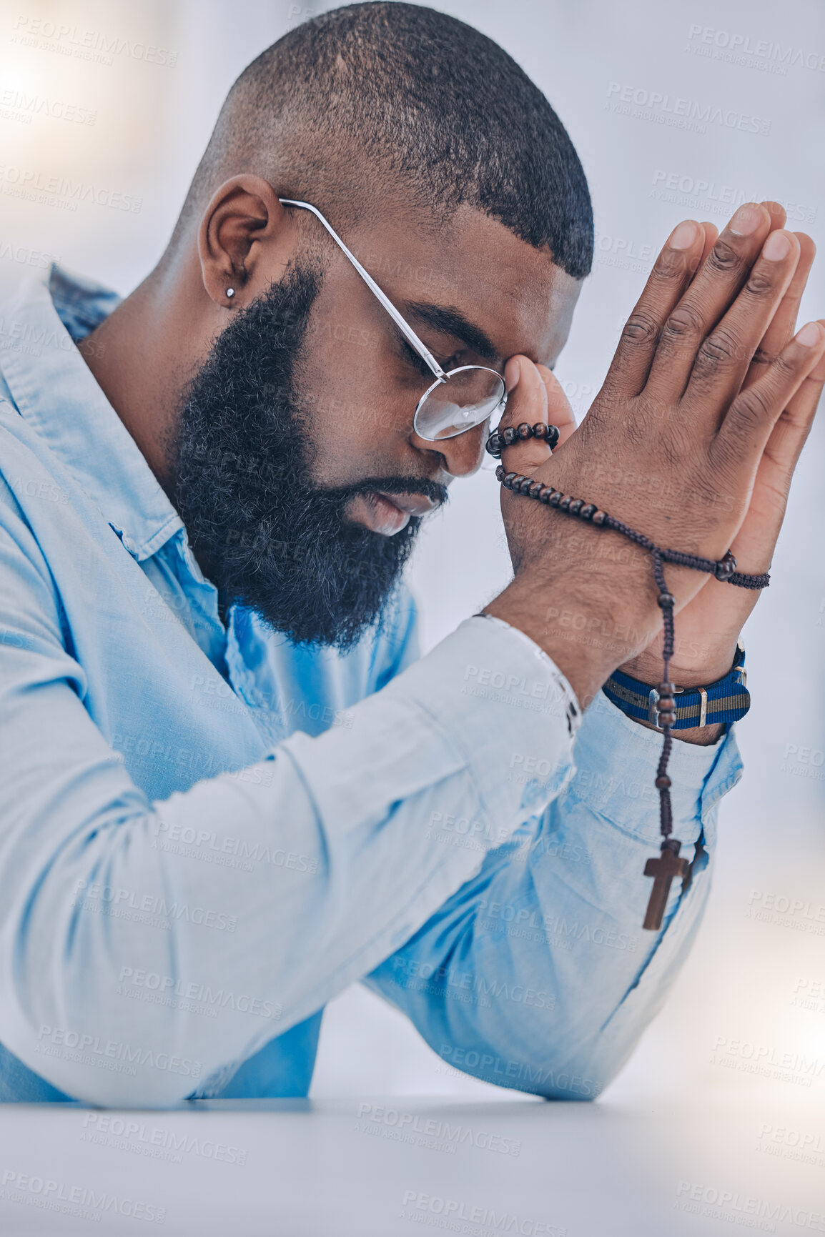 Buy stock photo Rosary, black man and hands with praying beads, religion and christian respect with gratitude and support. Help, praise or holy spirit healing of a person with spiritual necklace, prayer and cross