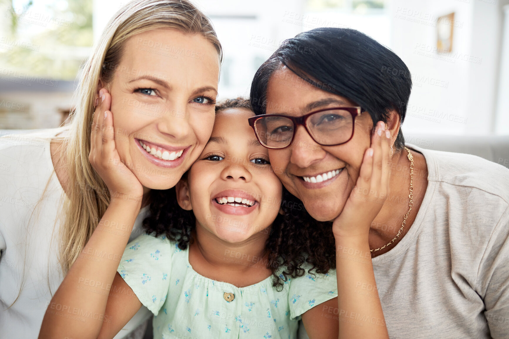 Buy stock photo Interracial family, portrait and home with smile, bonding and care with grandmother, mom and child. Happy, love and living room with children and hug together to relax in support with grandparents