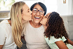 Interracial family, kiss portrait and home with love, bonding and parent care with grandmother, mom and child. Happy, smile and living room with children and support together relax with grandparents 