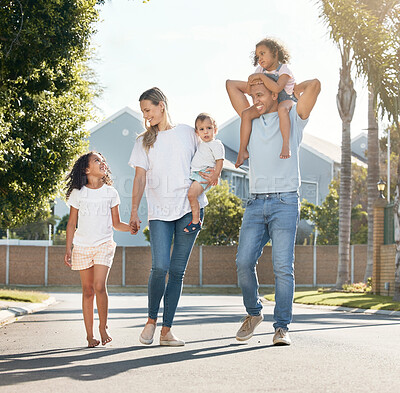 Buy stock photo Happy family, parents walking or children on road in neighborhood with support, care or love. Piggyback, interracial or dad on street to enjoy bonding together in nature with mom, kids or siblings