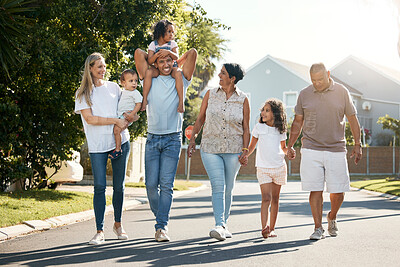 Buy stock photo Outdoor, big family and walking in neighbourhood street together for fun, bonding or activity with kids, parents and grandparents. Happy, time and relax in urban summer with children on vacation