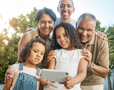 Buy stock photo Grandparents, girl and garden selfie with family, outdoor and smile with dad, post and social network in summer. Senior man, woman and children with photography, profile picture or memory on web blog