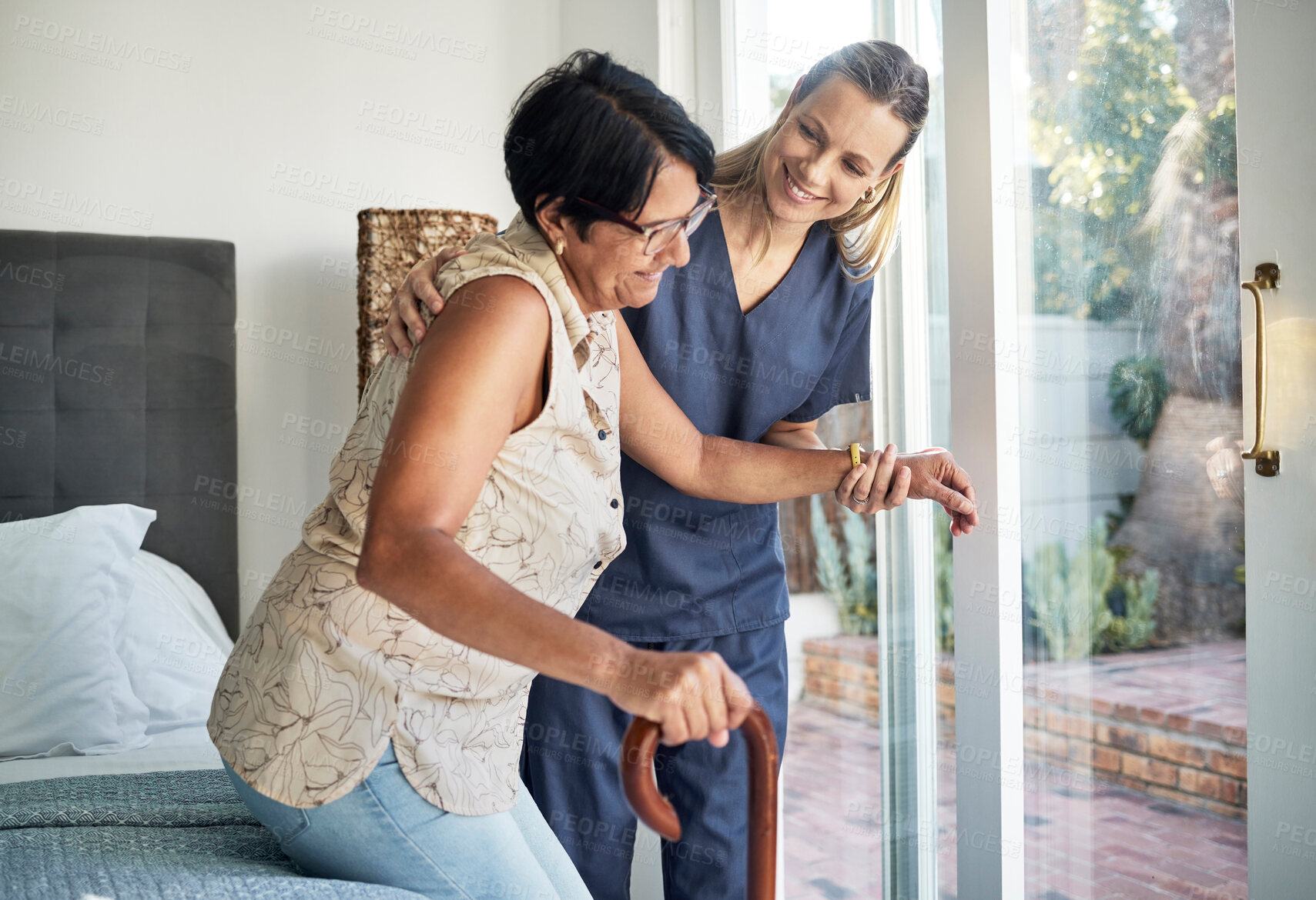 Buy stock photo Happy woman, nurse and senior in elderly care, support or walking with stick at old age home. Medical caregiver or therapist helping patient or person with a disability in retirement or physiotherapy