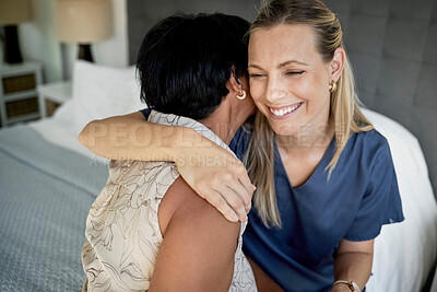 Buy stock photo Woman, senior mom and hug with smile, care and support with love, bonding or happy for family in bedroom. Embrace, elderly mother and daughter for trust, kindness or retirement on bed in nursing home