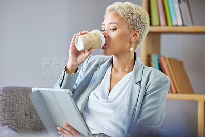 Buy stock photo Coffee break, tablet and business woman on a sofa relax, reading and checking email while working remote. Freelance, tea and female in living room with social media,  search and ebook in her home