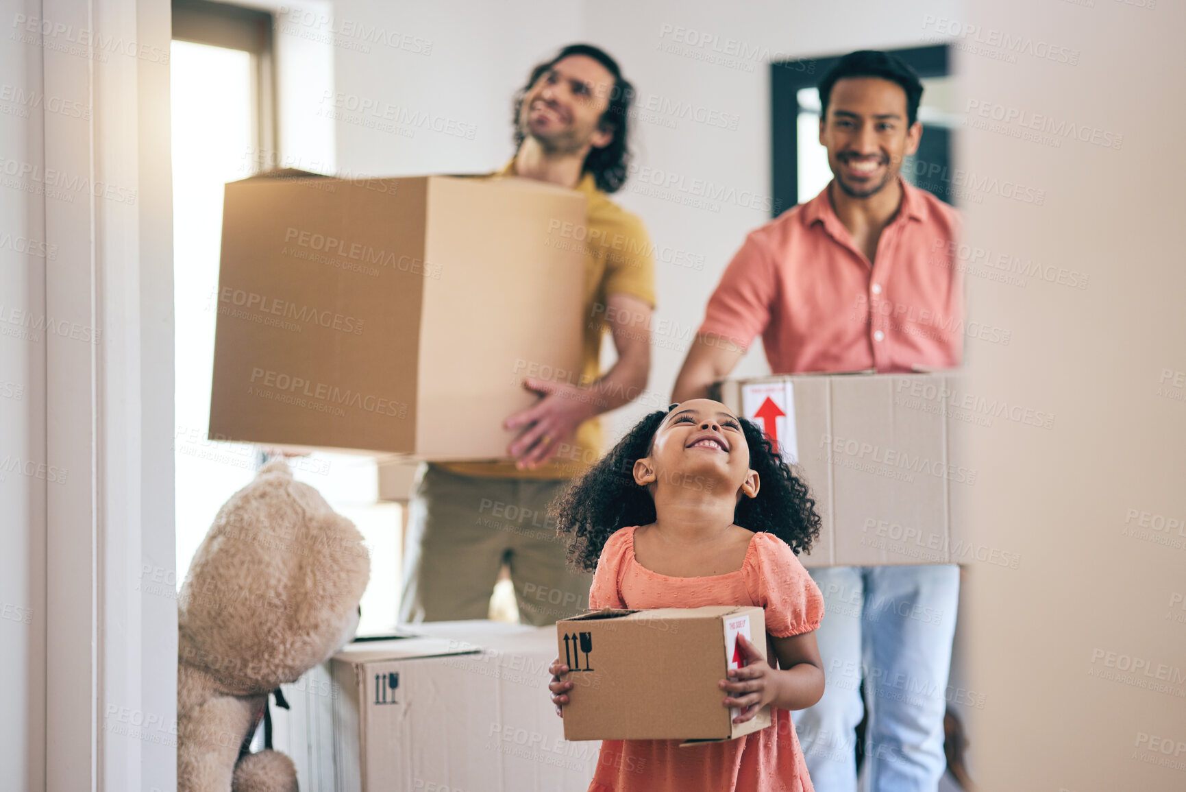 Buy stock photo Happy, family and box moving with child and gay parents in new home with cardboard package. Smile, kid and lgbt people together with real estate and property mortgage in a house helping father