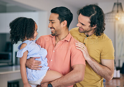 Buy stock photo Gay father, girl and hug in house for smile, thinking or together for bonding, care or love. LGBTQ men, parents and happy female child with embrace, diversity and adoption with pride in family home