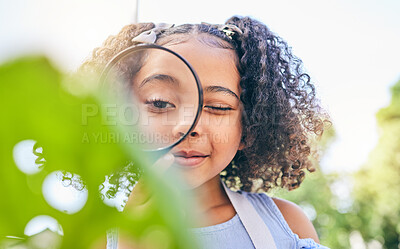 Buy stock photo Girl child, magnifying glass and plants in garden, backyard or park in science, study or outdoor. Young female kid, lens and zoom for nature, research or check for leaves, ecology or growth in summer