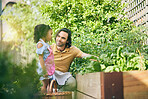 Gardening, dad and child with plants, teaching and learning with growth, backyard and nature. Small farm, sustainable food and father helping daughter in vegetable garden with love, support and fun.