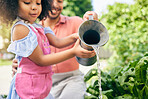 Gardening, father and daughter water plants, teaching and learning with growth in nature together. Backyard, sustainability and dad helping child watering vegetable garden with love, support and fun.