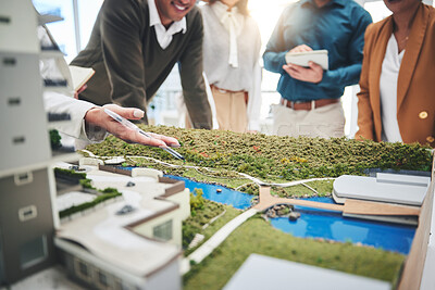 Buy stock photo Creative people, hands and real estate with 3d model of building design, architecture or property at office. Closeup of group architect team in meeting, project planning or floor layout at workplace
