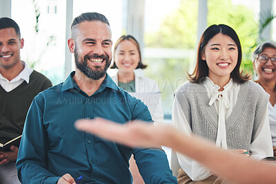 Buy stock photo Hand, presentation and happy business people in a meeting in the crowd of a seminar for a mentor. Smile, diversity and team of corporate employees in a work conference and listening to a boss