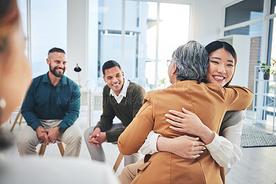 Buy stock photo Business people, women and hug in group therapy with care, love and bonding for mental health in workplace. Corporate men, staff and colleagues with smile for team building, diversity and gratitude