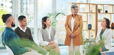 Buy stock photo Support, group therapy and senior woman talking in meeting, conversation and wellness. Counseling, psychology and people, therapist and community help in rehabilitation, mental health and healing