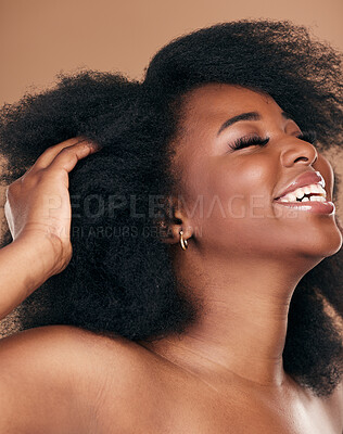 Buy stock photo Happy, black woman or hair care for afro, natural beauty or cosmetics on a brown studio background. Growth, hairstyle or African model with wellness, aesthetic or texture with salon treatment or glow