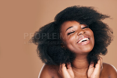 Buy stock photo Smile, black woman and hair care for afro, natural and beauty on a brown studio background. Growth, hairstyle and African model with cosmetics, mockup space or volume with salon treatment pr wellness