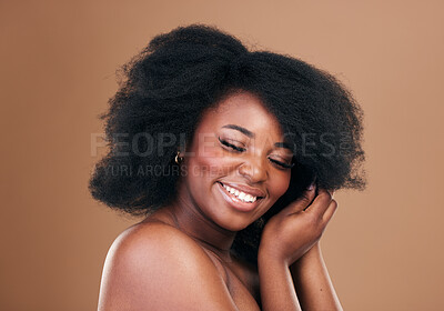 Buy stock photo Natural, black woman and hair care with beauty, smile and luxury on a brown studio background. Afro, hairstyle and African model with mockup space, aesthetic and shine with salon treatment and growth