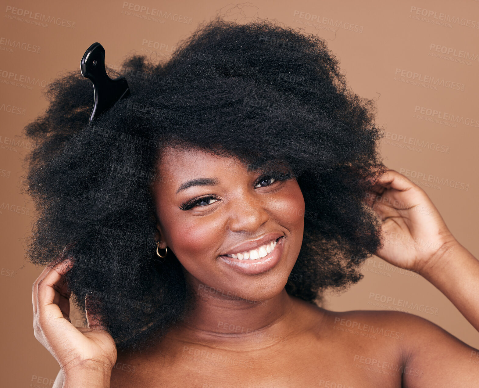 Buy stock photo Portrait, hair and comb for beauty with a black woman in studio on a brown background for natural cosmetics. Face, smile and haircare with a happy young afro female model indoor for shampoo treatment
