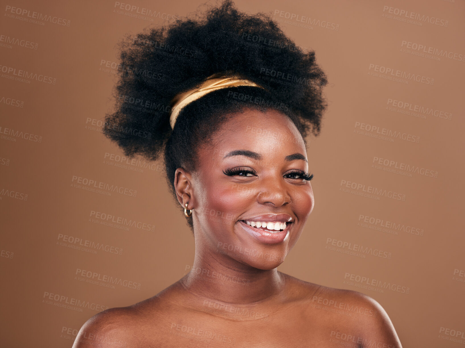 Buy stock photo Portrait, natural hair care or happy black woman with afro, self love or smile on a brown studio background. Hairstyle, healthy growth or African model with glow or beauty with aesthetic or wellness