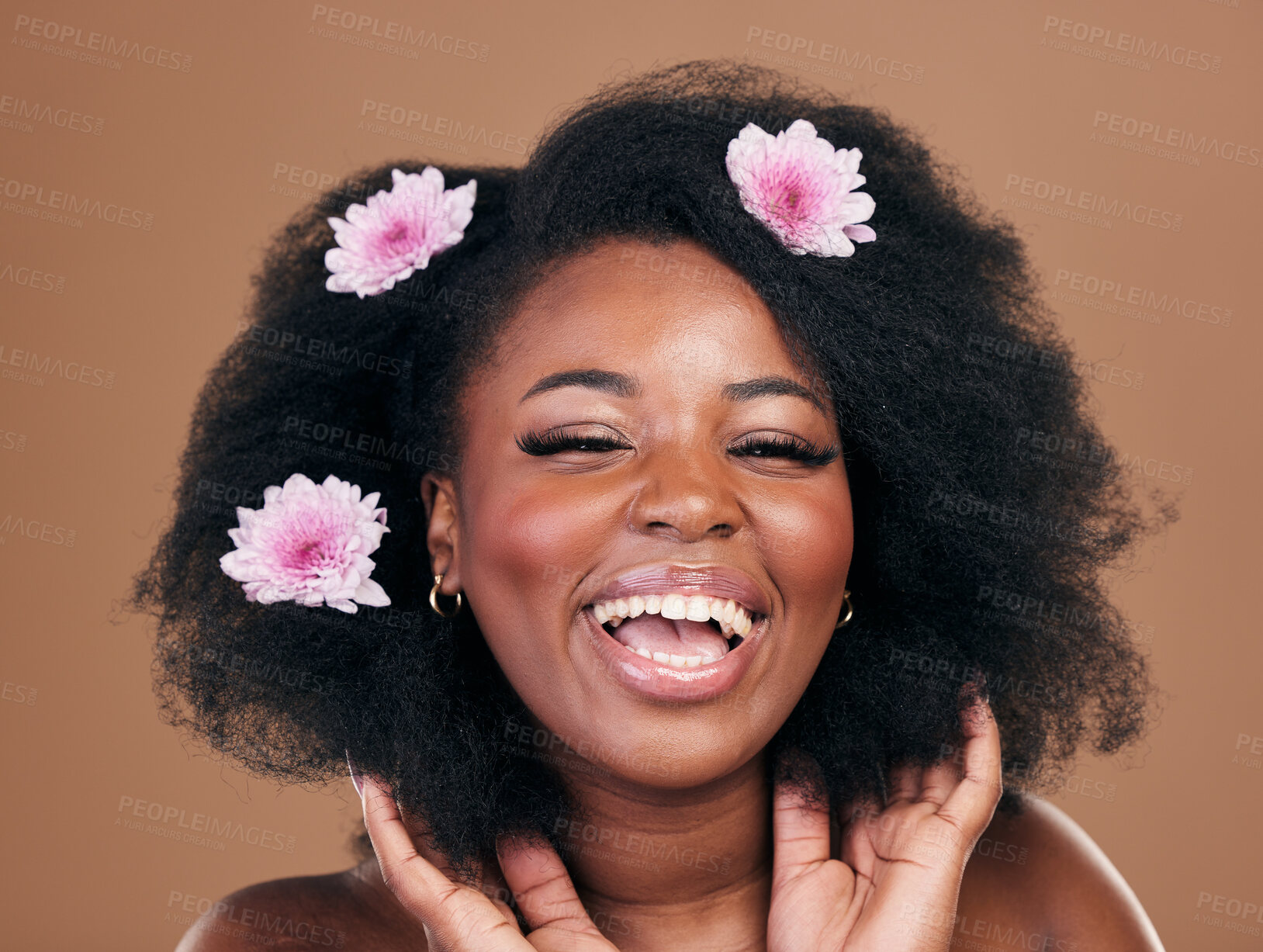 Buy stock photo Portrait, hair care or happy black woman with flowers, afro or smile on a brown studio background. Hairstyle, beauty and African model with texture, shine and volume with aesthetic, wellness and glow