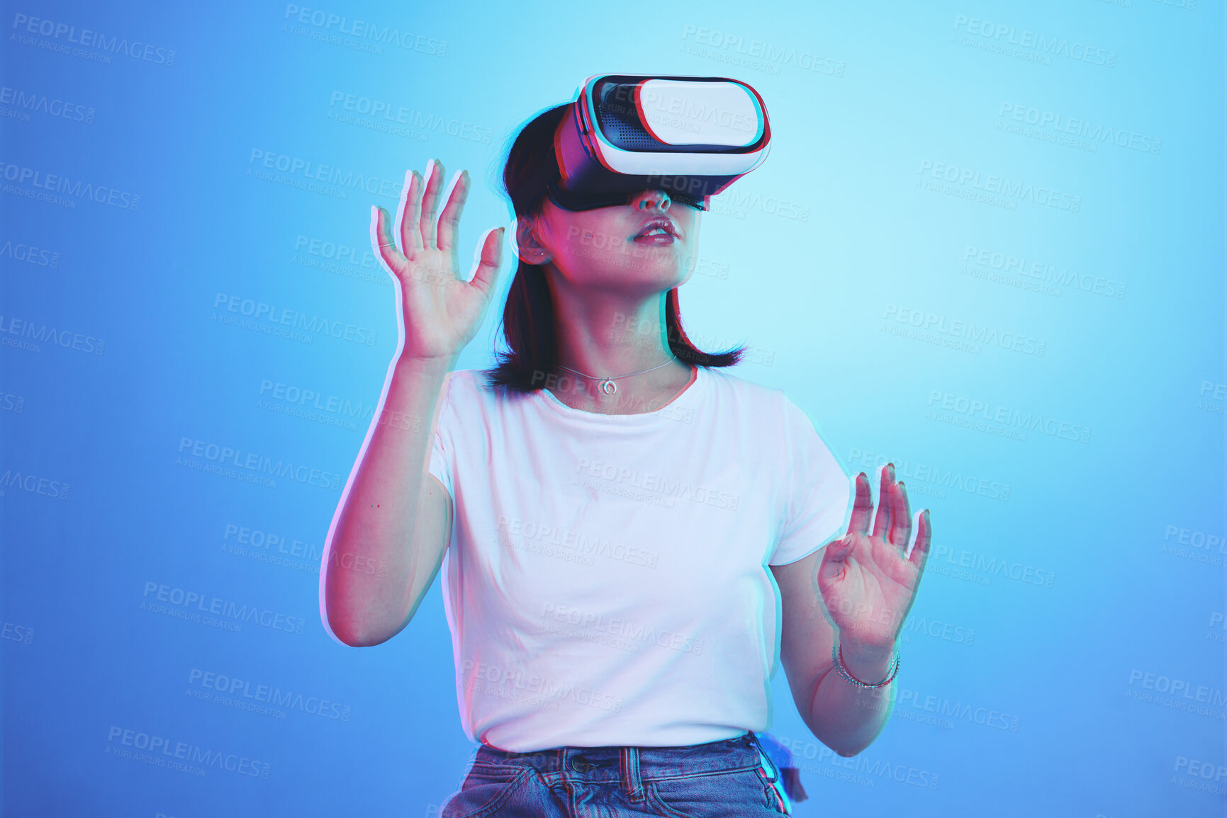 Buy stock photo Woman, VR and glasses for futuristic metaverse, 3d games and gen z education or digital e learning. Young person or student in virtual reality, high tech with vision, neon and blue,studio background