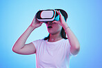 Woman, VR and glasses with wow in futuristic experience, 3d games and gen z education or digital e learning. Young person or student in virtual reality, high tech and vision on blue studio background