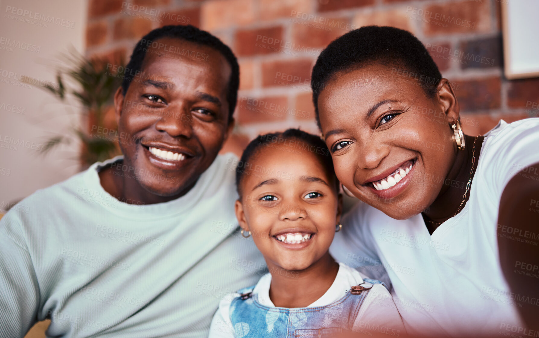 Buy stock photo Selfie of black family in home, parents and kid with bonding, love and relax in living room together. Portrait of happy mom, dad and girl child in apartment with smile, man and woman with daughter.
