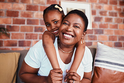 Buy stock photo Portrait of mom and kid on sofa with hug, bonding and relax in living room together. Love, mother and daughter on couch in apartment with embrace, support and trust for black woman with girl child.