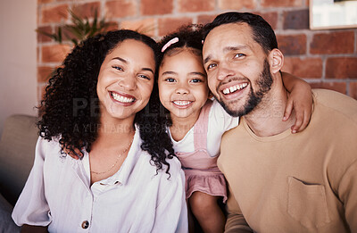 Buy stock photo Family, happy and portrait with a hug on a home sofa for fun, bonding and time together. A man, woman or parents and girl kid in a lounge with love, care and happiness in a house in Puerto Rico