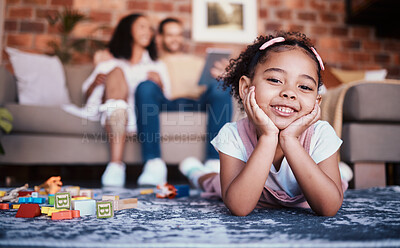 Buy stock photo Child, toys and playing portrait in home with development and building block in living room. Family, youth smile and happy young girl with parents in a house together with care and kids learning
