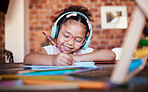 Writing, headphones and child at home with music, learning and homework for school. Kid, studying and happy with radio and audio streaming in a house with listening and drawing for creative project