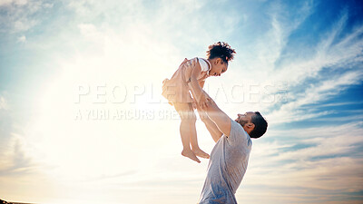Buy stock photo Father lifting kid, air and blue sky with family, travel and freedom outdoor, bonding and ocean with girl and man. Happy people, sunshine and tropical vacation, child flying with dad and adventure