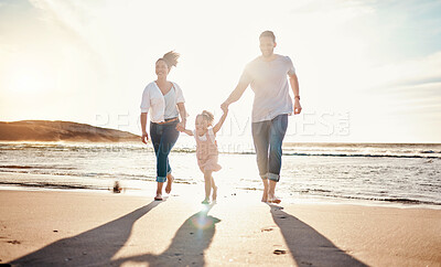 Buy stock photo Family, beach and holding hands, parents and kid with travel and bonding, love and walking together in nature. Vacation, ocean and happy people outdoor, parents and child with sun and adventure 
