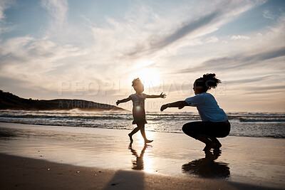 Buy stock photo Kid is running to mom, beach and silhouette, family with games and love, travel and freedom together outdoor. People, sunset and adventure, woman and girl bonding on tropical holiday and nature
