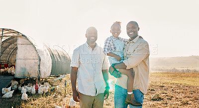 Buy stock photo Happy, gay couple and portrait of black family on chicken farm for agriculture, environment and bonding. Relax, lgbtq and love with men and child farmer on countryside field for eggs, care or animals