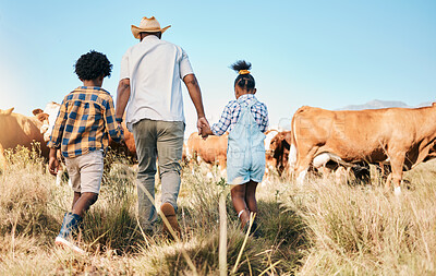 Buy stock photo Farm, cows and father holding hands with children in countryside for ecology, adventure and vacation. Family, sustainable farming and back of dad with kids for bonding, relax and learning with animal