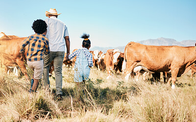 Buy stock photo Farm, family and cow, agriculture and livestock with man and kids, sustainability and agro business in countryside. Farmer, children and walk in field, environment and cattle animal outdoor with back