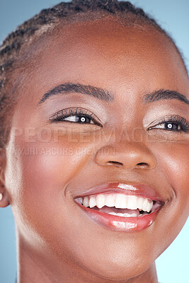Buy stock photo Face of black woman for skincare, beauty and smile on blue background for wellness, health and spa. Salon aesthetic, dermatology and closeup of happy person in studio with cosmetics, makeup and glow