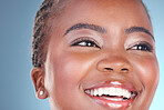 Face of happy black woman for skincare, beauty and facial on blue background for wellness, health and spa. Salon aesthetic, dermatology and closeup of person in studio with cosmetics, makeup and glow
