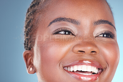 Buy stock photo Face of happy black woman for skincare, beauty and facial on blue background for wellness, health and spa. Salon aesthetic, dermatology and closeup of person in studio with cosmetics, makeup and glow