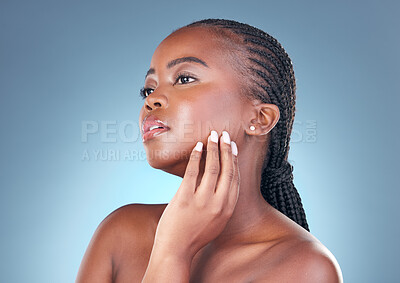 Buy stock photo Beauty, skin care and face of a black woman with dermatology, natural makeup and manicure. Headshot of African person on a grey background with cosmetics and facial glow with hand for soft touch