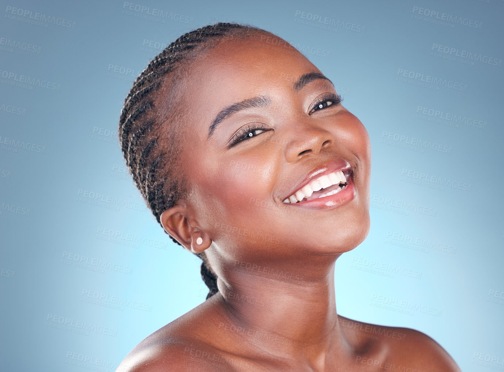 Buy stock photo Face of happy black woman for makeup, beauty and cosmetics in studio for wellness, health and spa. Salon aesthetic, dermatology and African person with skincare, facial and glow on blue background