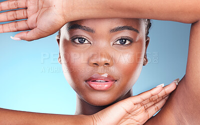 Buy stock photo Portrait, skincare and black woman with makeup, luxury and dermatology on a blue studio background. Face, African person or model with lip gloss, treatment or glow with aesthetic, shine and cosmetics