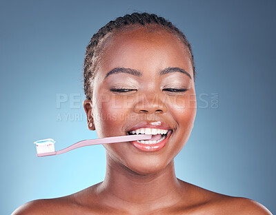 Buy stock photo Happy black woman, toothbrush and teeth in dental cleaning or care against a studio background. Face of African female person smile in morning routine tooth whitening, oral or mouth and gum hygiene