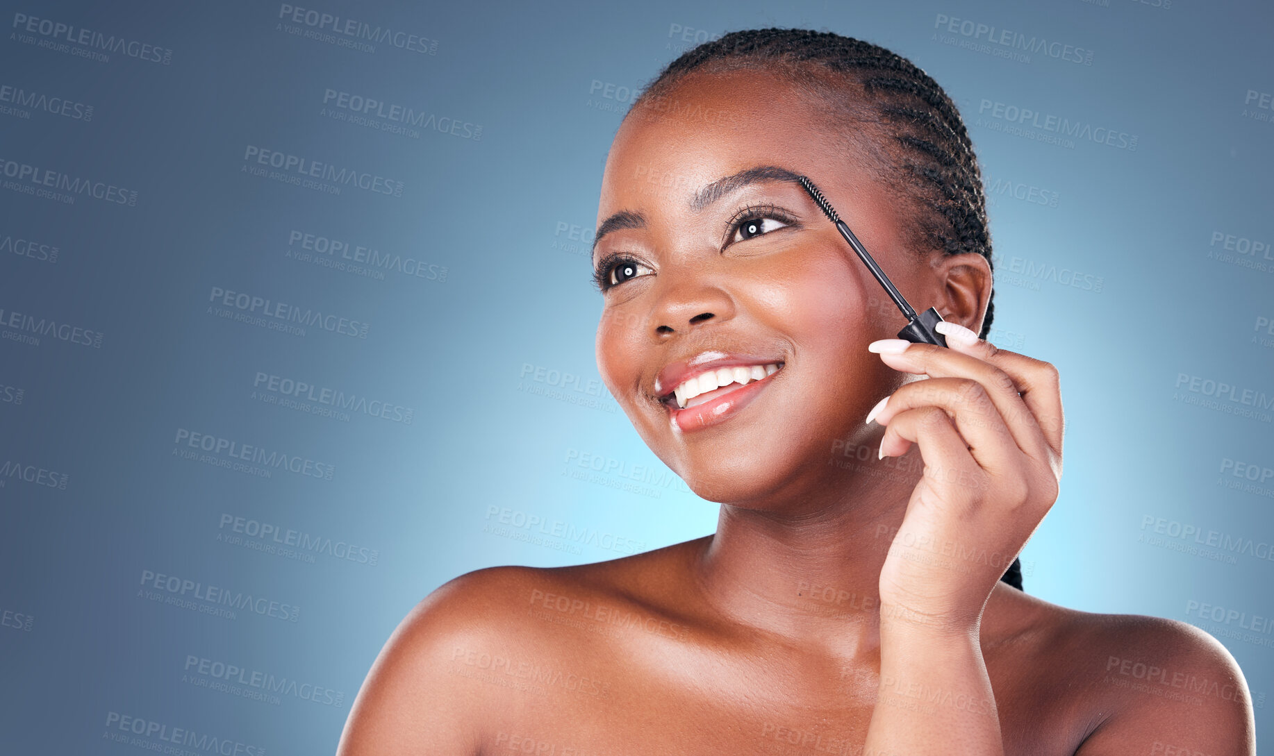 Buy stock photo Face brush, eyebrow and beauty of a woman with dermatology, natural makeup and smile. Happy African person on blue background with brow cosmetics, mascara and facial glow for self care in studio