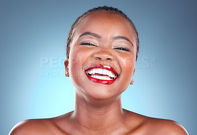 Buy stock photo Portrait, funny and black woman with beauty, makeup and cosmetics on a blue studio background. Happy person, face and model with humor, smile and dermatology with skincare, wellness and aesthetic